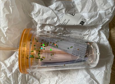 Cup with straw