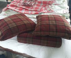Feather filled tarten cushions and bolster