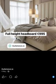 Full wall height headboard in cream boucle fabric
