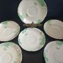 Lovely Set of Six Vintage English Bone China Hand Painted Saucers, (For Use as Petit Fours Plates), with Green Flowers on a Creamy Yellow Base Glaze. Image 2