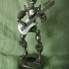 Sculpture/ figurine with guitar