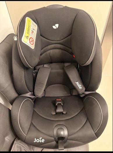 Joie stages car seat suitable from birth to 4 years.Infint incert included . Chair secured by car seatbelt