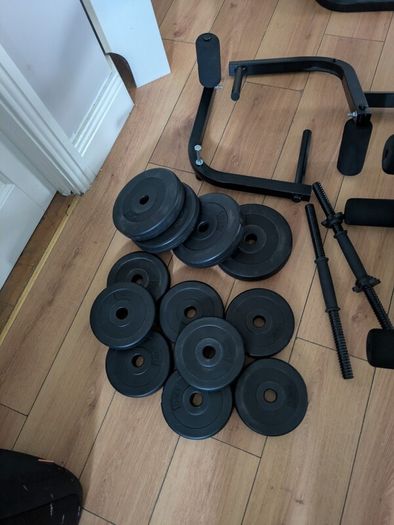 weight bench with weights and bars