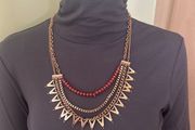 Multichain gold tone necklace