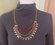 Multichain gold tone necklace