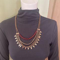 Multichain gold tone necklace