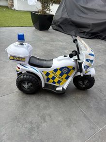 kids ride on police motor bike