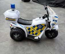 kids ride on police motor bike