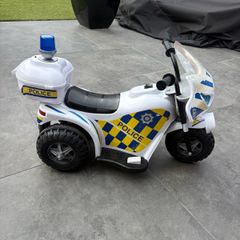 kids ride on police motor bike