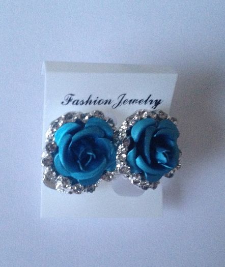 Brand new Turquoise / light blue Rose & Diamond earrings