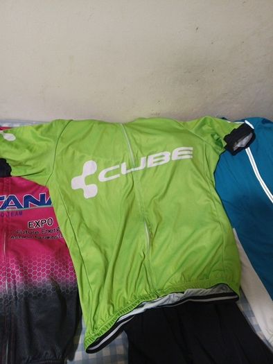 2 cycling shirts 1 is cube worth easily 50 euro and is brand new and pants with padding for on the saddle brand new never worn the second shirt is the official astana team training shirt also brand new  is the  would like to sell all together for a good p