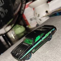 Hot Wheels '73 Ford Falcon XB you have appears to be the black 2013 HW Showroom/HW Garage mainline release with green stripes