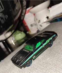 Hot Wheels '73 Ford Falcon XB you have appears to be the black 2013 HW Showroom/HW Garage mainline release with green stripes