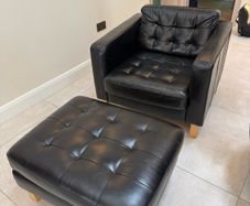 Black Leather Armchair and Matching Ottoman Footstool