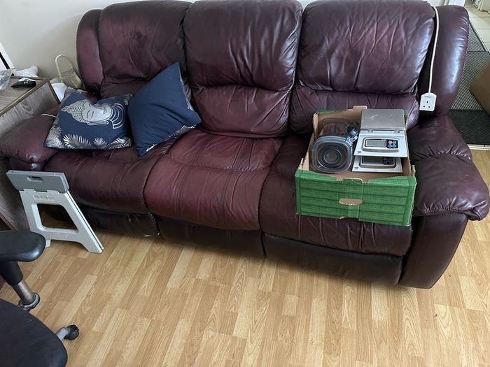 Leather recliner is decent working condition, needs a little patch work