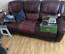 Leather recliner is decent working condition, needs a little patch work