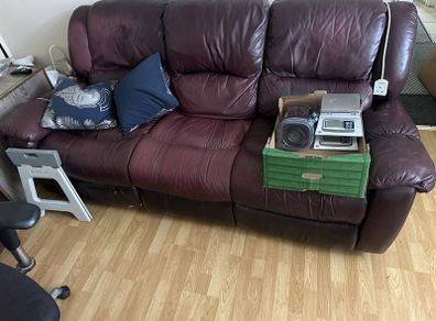Leather recliner is decent working condition, needs a little patch work