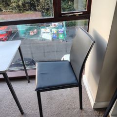Black faux leather dining chair