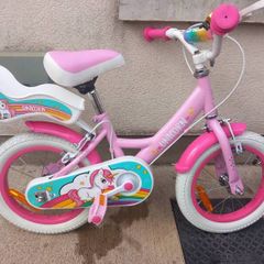 Kids unicorn bike size 14 inch wheels.