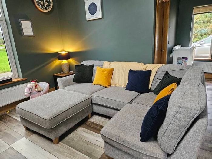 Corner sofa with chaise footstool