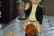 1950s to 70s Working Musical Decanter Hobo Clown Sitting on a Barrel. The base plays the tune Show Me the Way to Go Home, reminded me of the song from Jaws