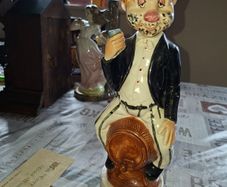 1950s to 70s Working Musical Decanter Hobo Clown Sitting on a Barrel. The base plays the tune Show Me the Way to Go Home, reminded me of the song from Jaws