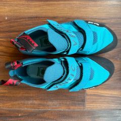 Red chilli climbing shoes and black diamond chalk bag