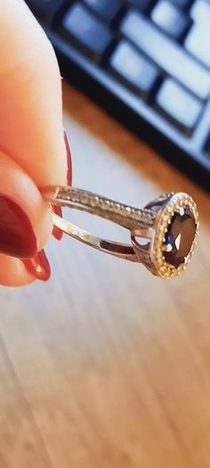 9 ct White Gold & Sapphire ring,size O. Cubic Zirconia