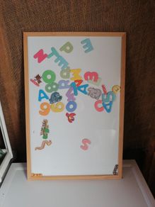 White magnetic board and magnets