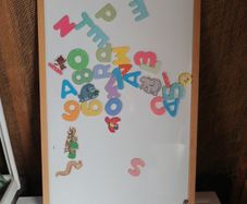 White magnetic board and magnets