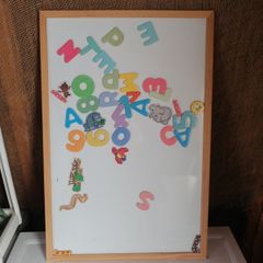 White magnetic board and magnets