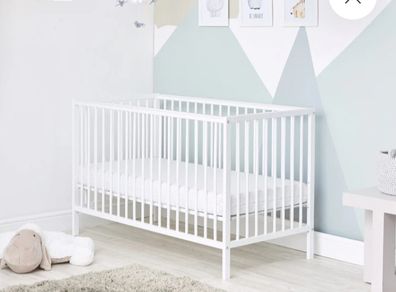 small cot with mattress