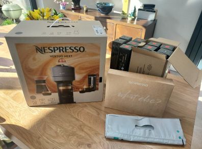 Nespresso Vertuo coffee machine with 120 pods