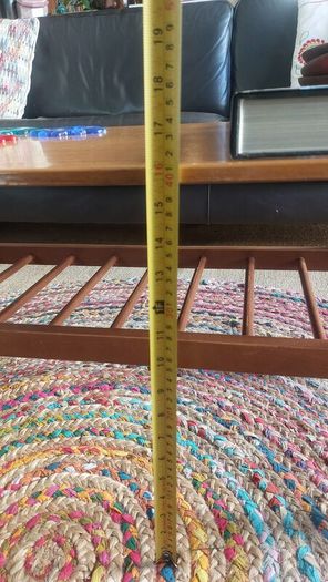 Unusual and Practical Mid-Century Modern Wooden Coffee Table with a Hard-Wearing Wood-Patterned Melamine Top and Slatted Magazine Shelf
