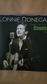 Lonnie Donegan. Puttn" On The Country Style.