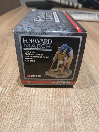 Corgi Forward March United Nations Relief Worker And Patient