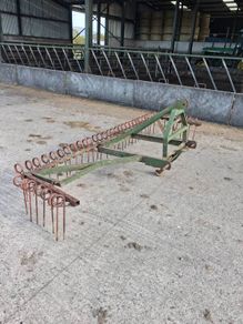 Grass harrow