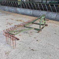 Grass harrow