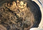 Clock with moving gears