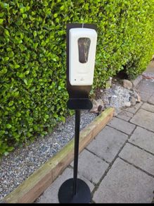 Free standing hand sanitiser dispenser