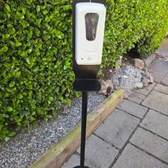 Free standing hand sanitiser dispenser