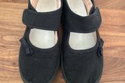 Girls black plimsoles size 12