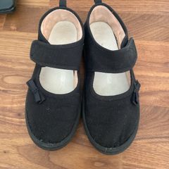 Girls black plimsoles size 12