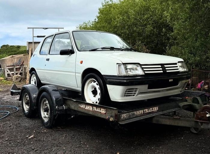 bryan james car carrying trailer Brian