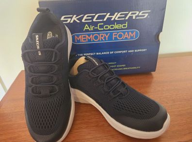 Brand new Navy Skechers shoes