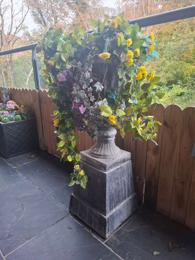 Cast garden Urn with artificial flowers