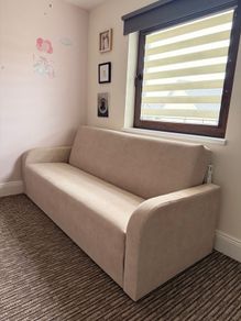 Beige sofa bed