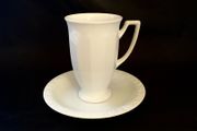 A classic mocha/coffee mug and saucer by Rosentha