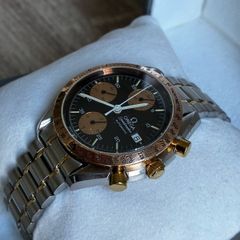 Omega Speedmaster 3316.50 (with 18k gold accents) and box/ papers