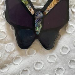 A striking vintage butterfly pendant necklace by Accessorize, featuring iridescent mother of pearl / abalone shell set within black, purple and deep blue resin.